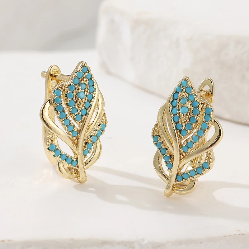 Turquoise Stone Ring - أقراط دائرية مبتكرة على شكل ورقة