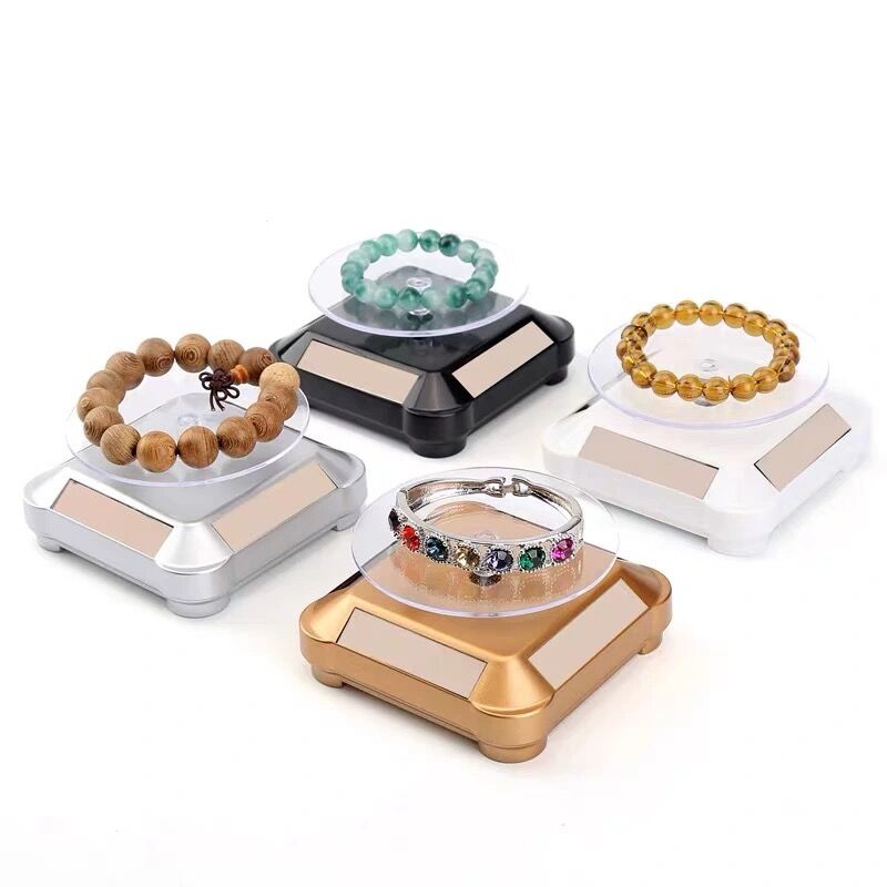حامل عرض دوار بالطاقة الشمسية  - مراجعة Jewelry And Watches Exhibition وسعره