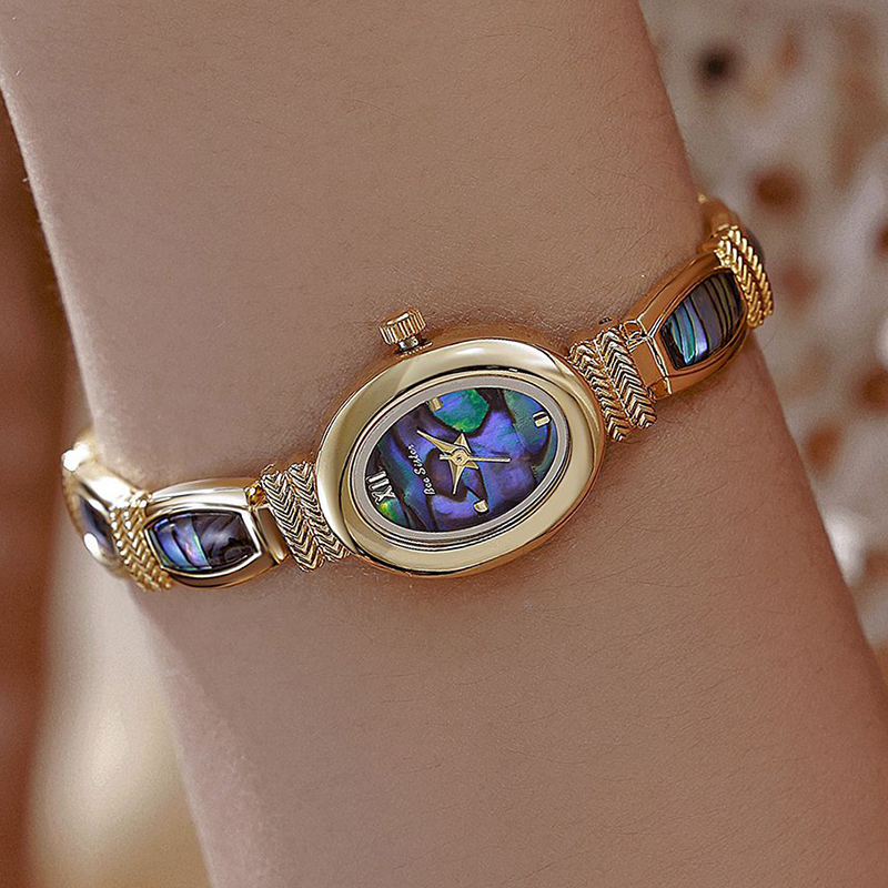 البيضاوي الهاتفي النساء ساعات  - مراجعة Jewelry Watches Gold وسعره