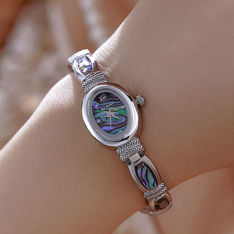 البيضاوي الهاتفي النساء ساعات  - مراجعة Jewelry Watches Gold وسعره